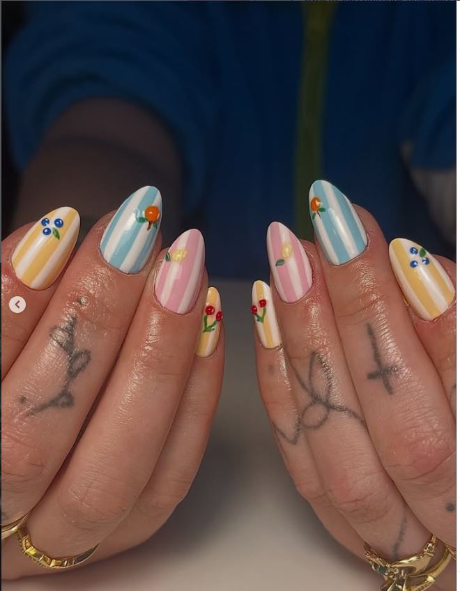 Pastel stripes and floral nail design